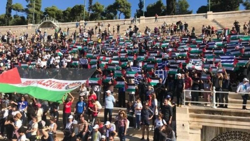 الجالية الفلسطينية في اليونان تشارك في الماراثون الدولي