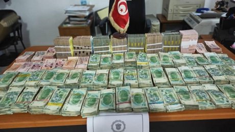 تفكيك شبكة دولية مختصة في غسيل الأموال