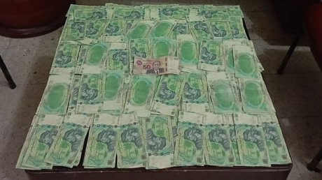 الإطاحة بوفاق إجرامي مختص في تدليس العملة التونسية